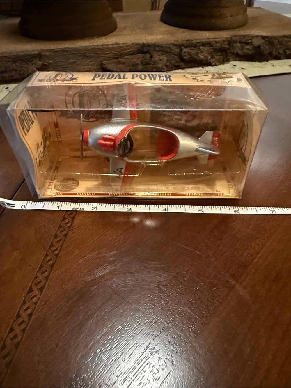 Silver and Red Pedal Power Toy Plane